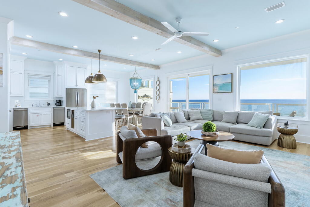 20405 Front Beach Road Panama City Beach, FL 32413 - Photo 5 of 130 a living room with furniture and kitchen view