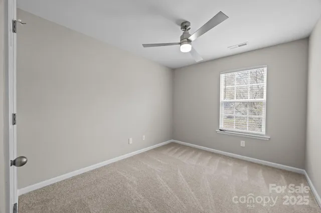 a bathroom with a granite countertop toilet a sink and a bathtub