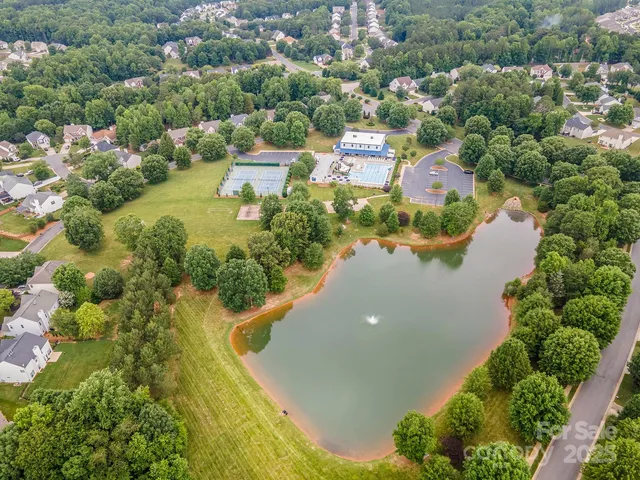 a balcony with table and chairs