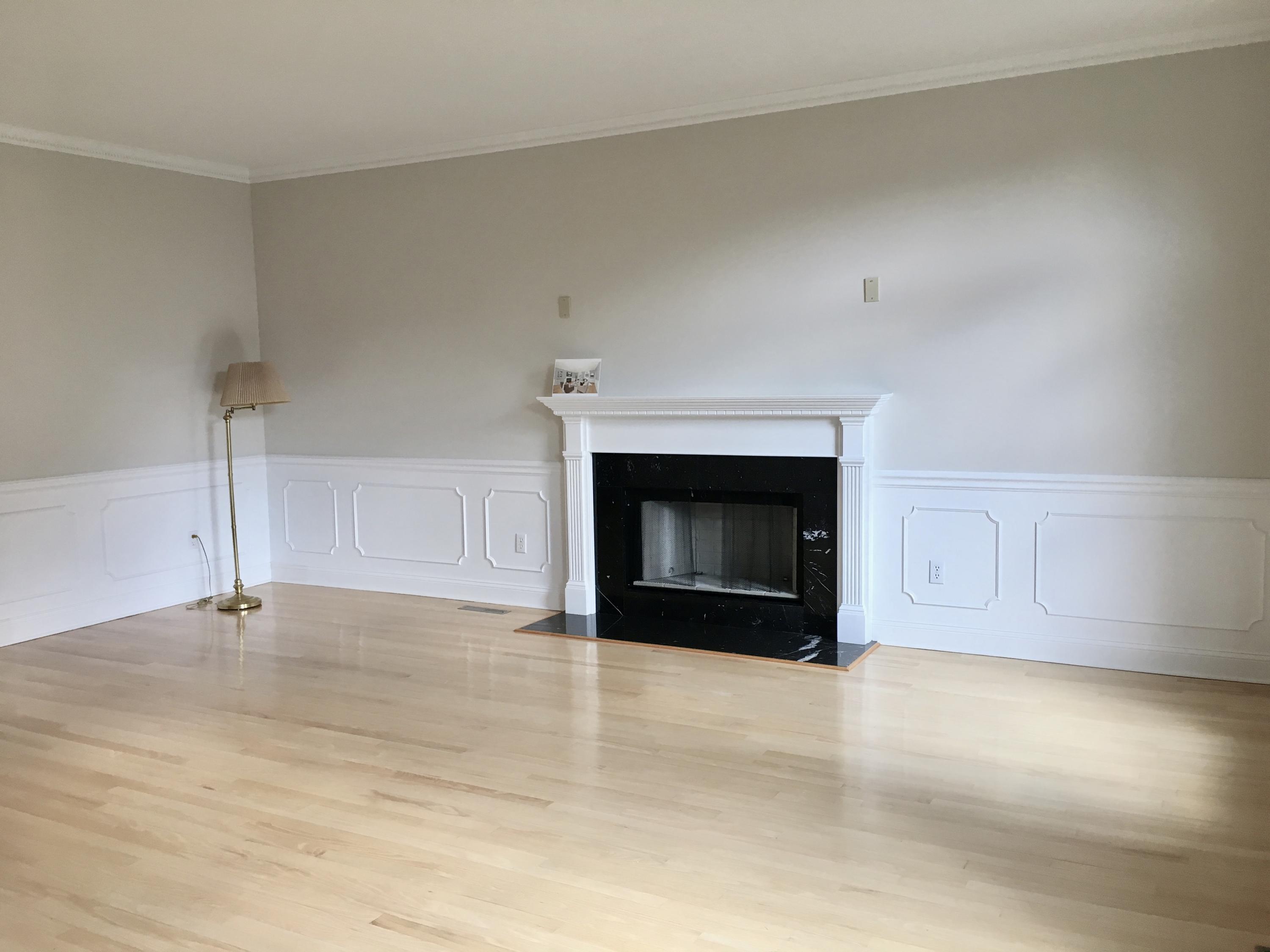 152 Old Studio Road New Canaan, CT 06840 - Photo 15 of 35 a view of an empty room with a fireplace