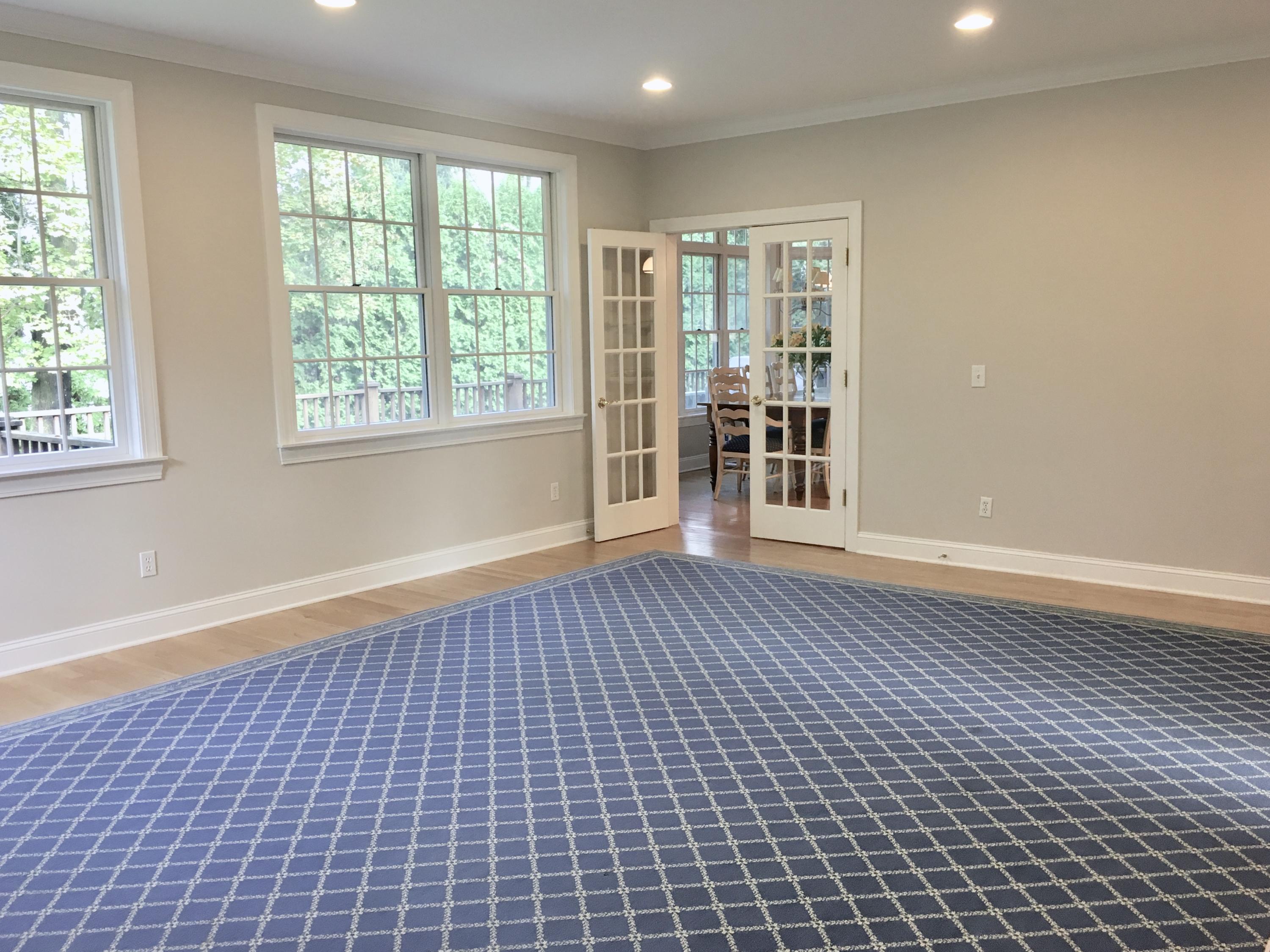 152 Old Studio Road New Canaan, CT 06840 - Photo 16 of 35 a view of an empty room with wooden floor and a window