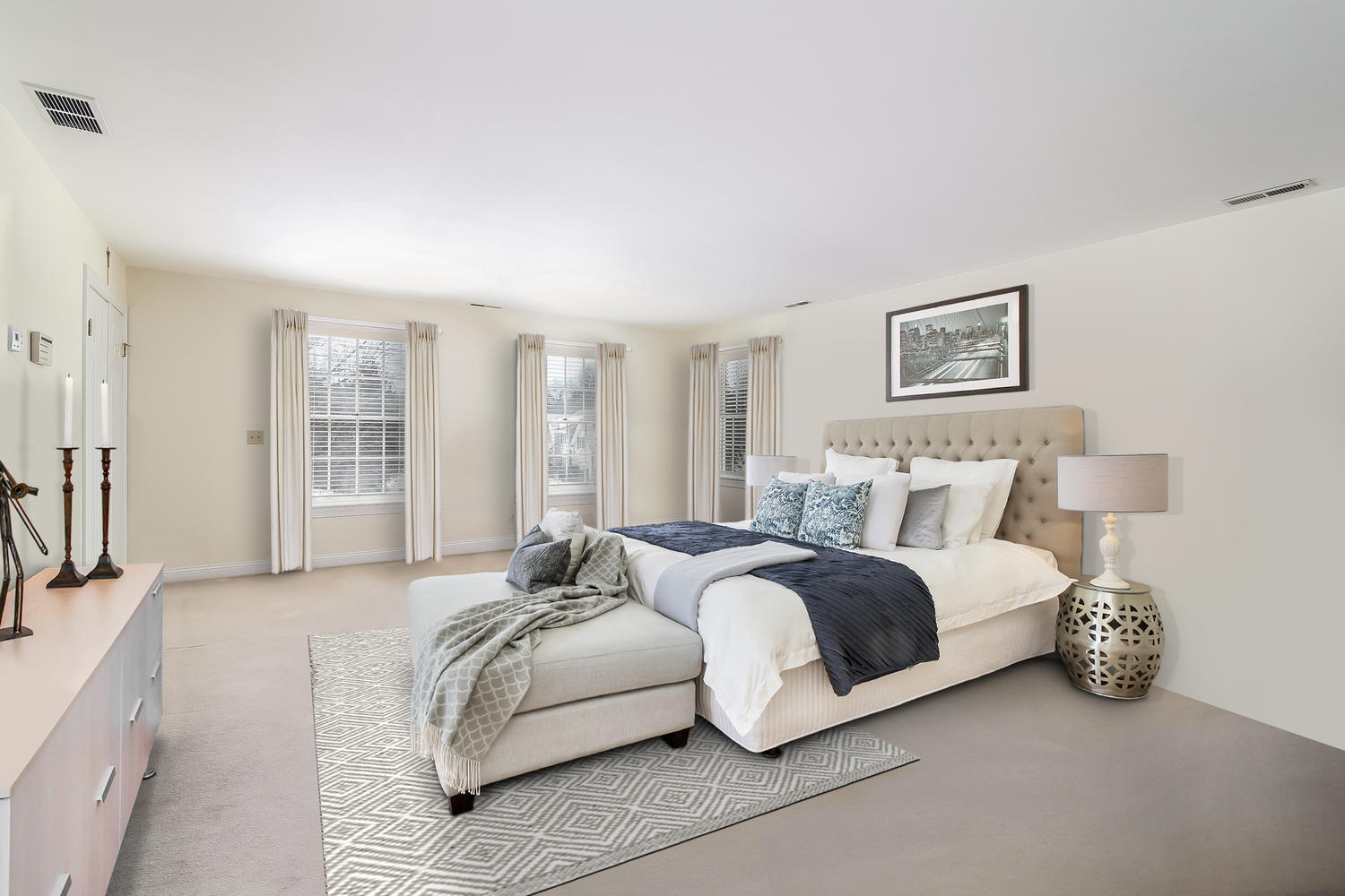 152 Old Studio Road New Canaan, CT 06840 - Photo 21 of 35 a spacious bedroom with a bed and a couch