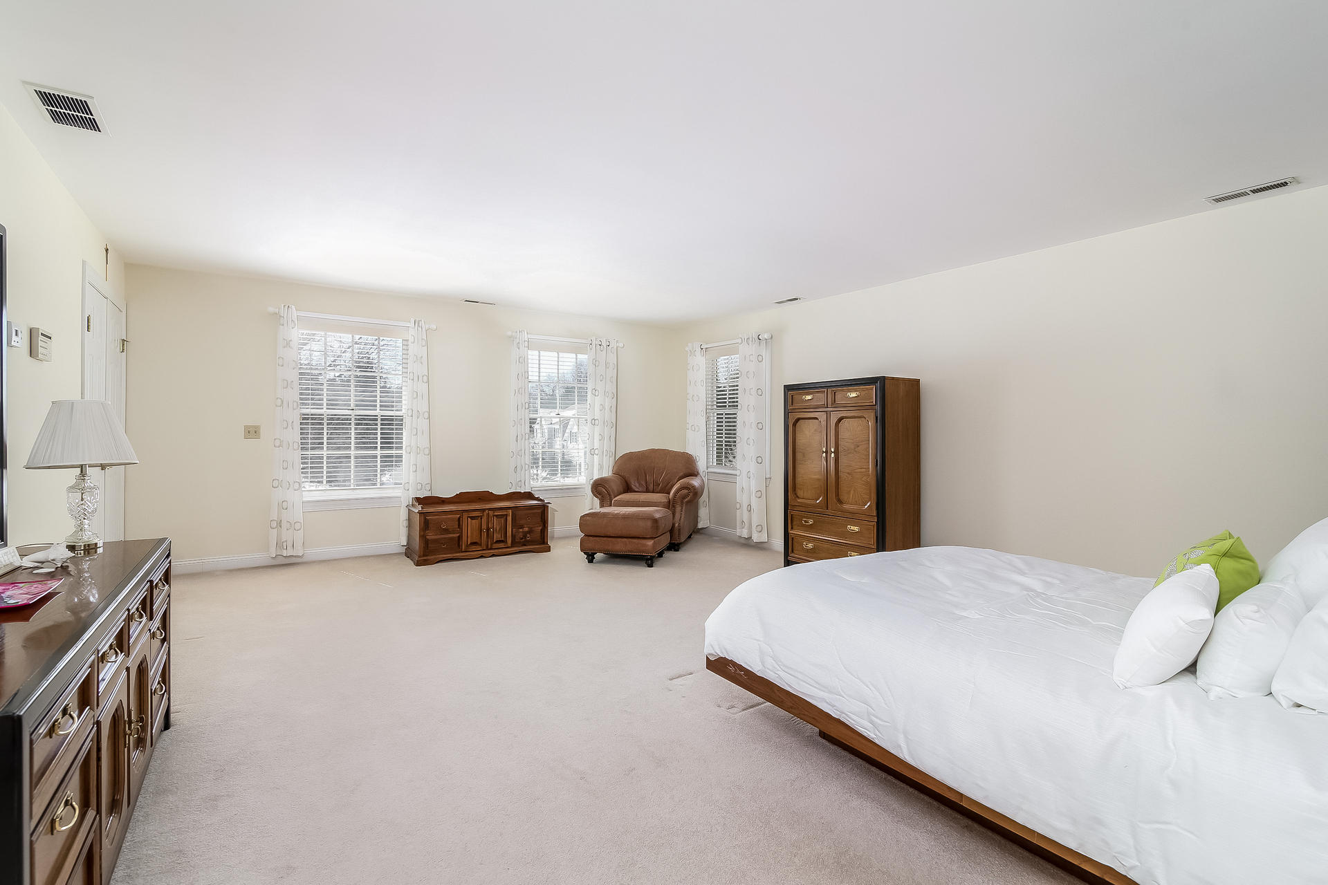 152 Old Studio Road New Canaan, CT 06840 - Photo 22 of 35 a bedroom with bed couch and a window