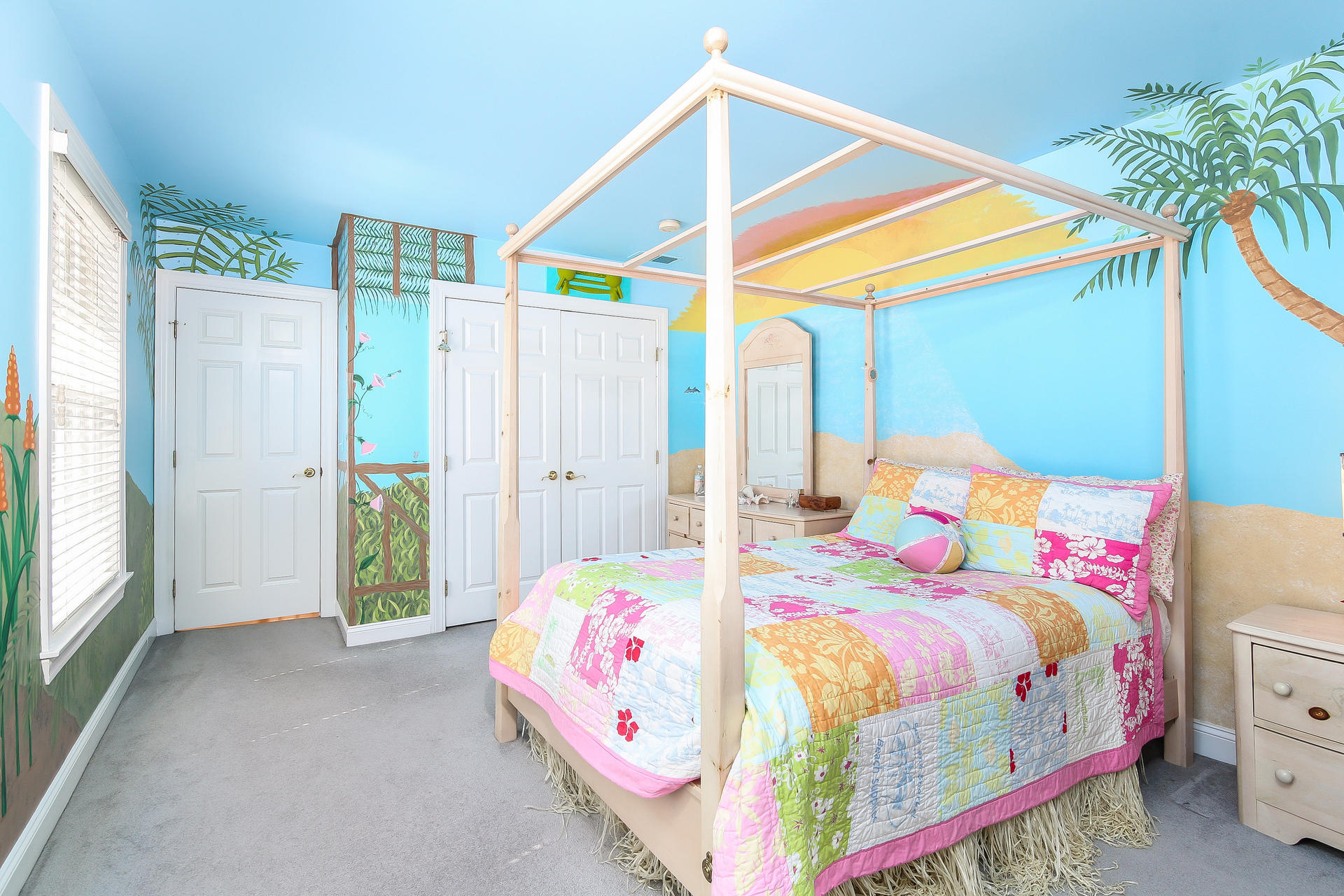 152 Old Studio Road New Canaan, CT 06840 - Photo 26 of 35 a bedroom with a bed and a chandelier