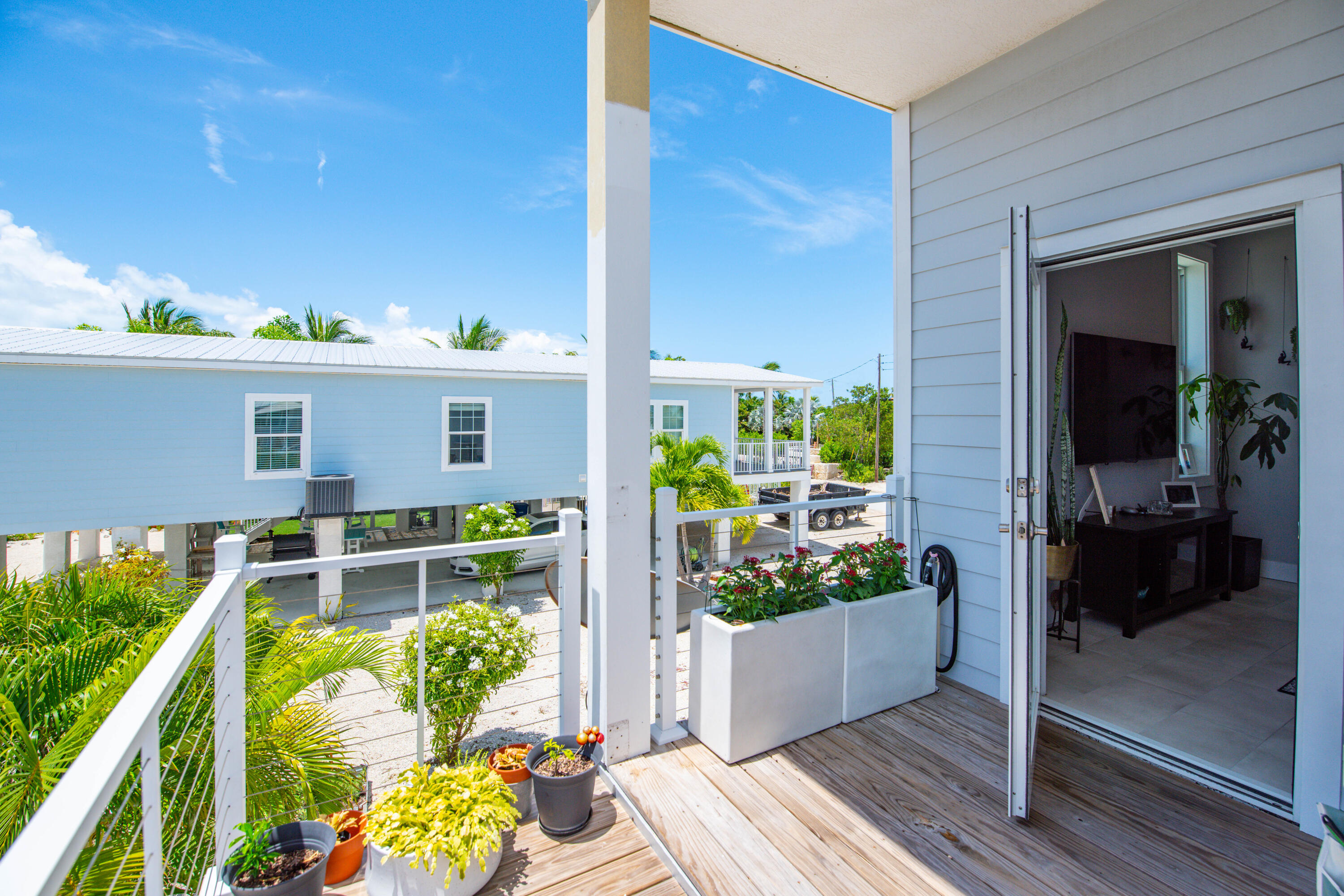 930 80th Street Marathon, FL 33050 - Photo 27 of 49 a front view of a house with a porch