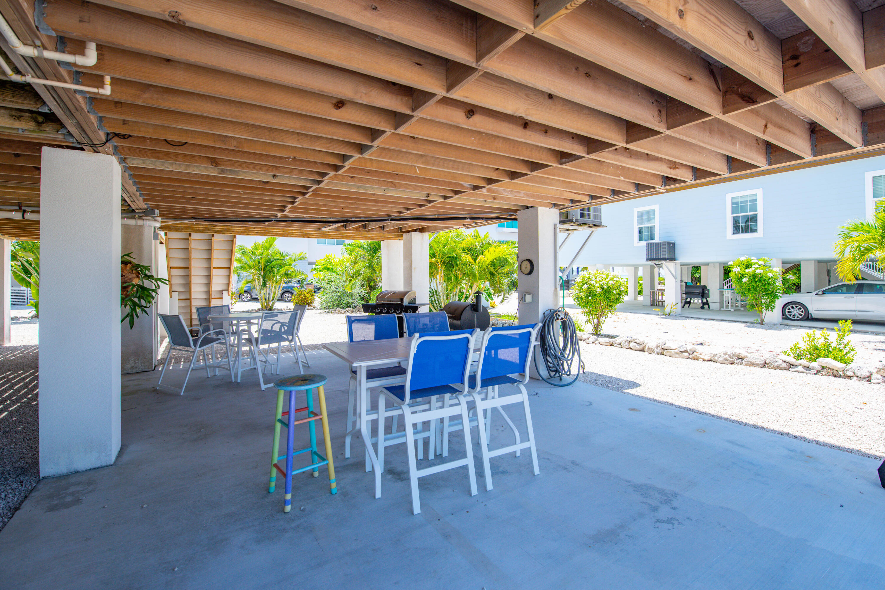 930 80th Street Marathon, FL 33050 - Photo 36 of 49 a dining space with furniture and a garden