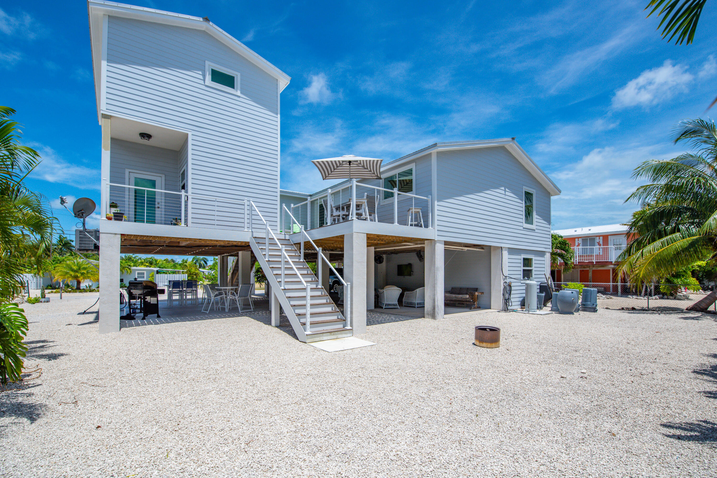 930 80th Street Marathon, FL 33050 - Photo 46 of 49 a view of a house with a patio