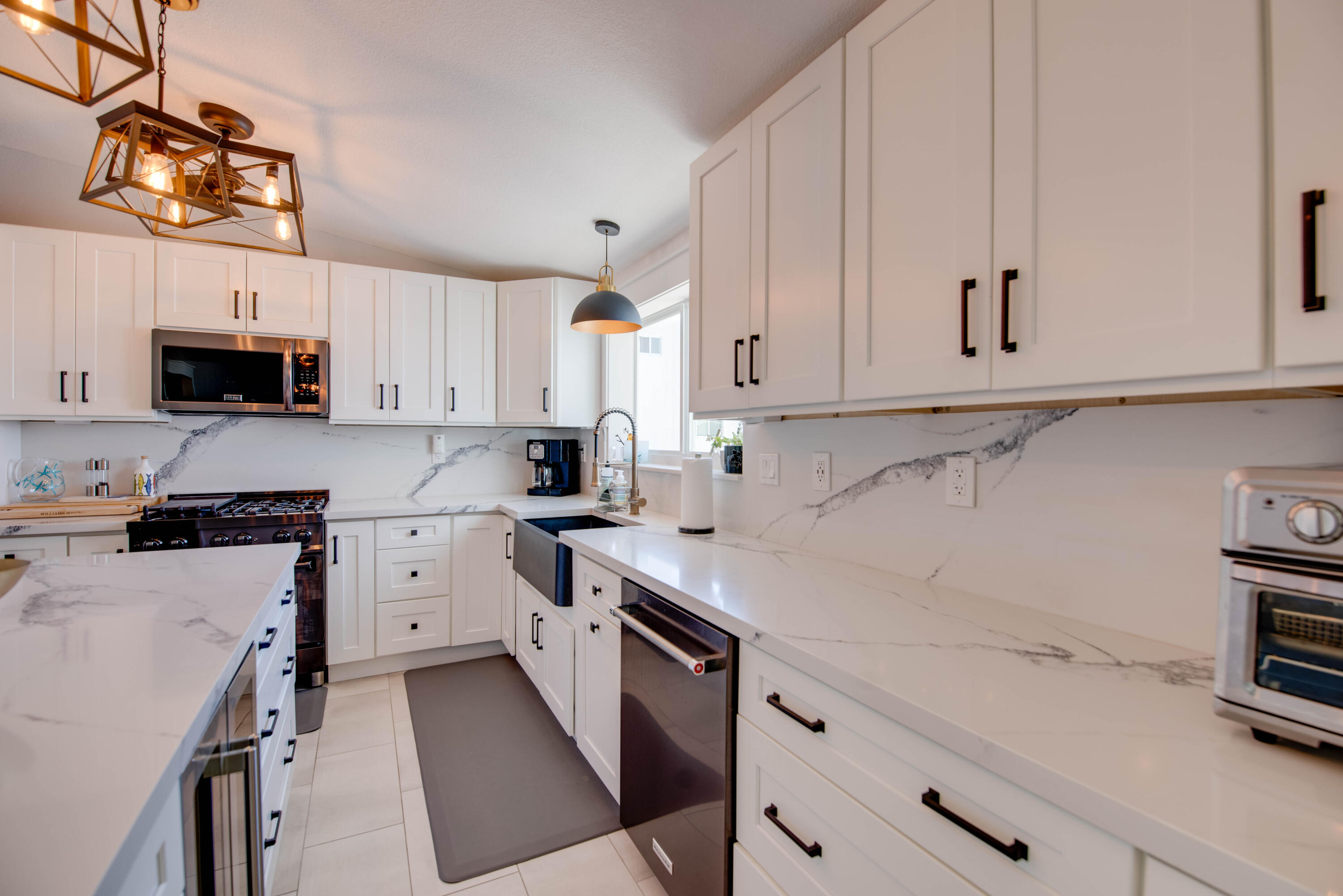 930 80th Street Marathon, FL 33050 - Photo 5 of 49 a kitchen with cabinets appliances a sink and a counter top space