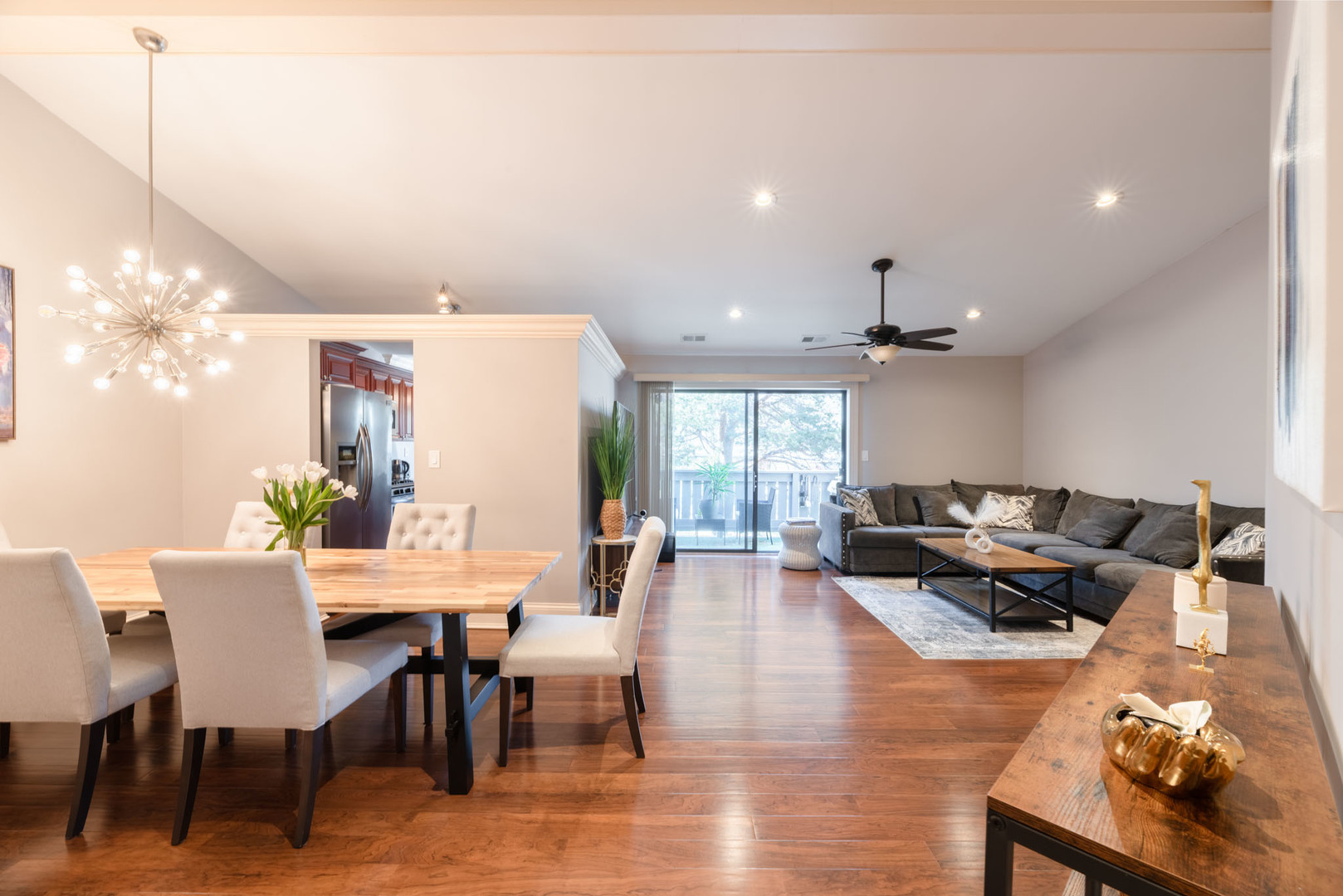 1631 West Partridge Court, Unit 8 Arlington Heights, IL 60004 - Photo 2 of 26 a living room with furniture and wooden floor
