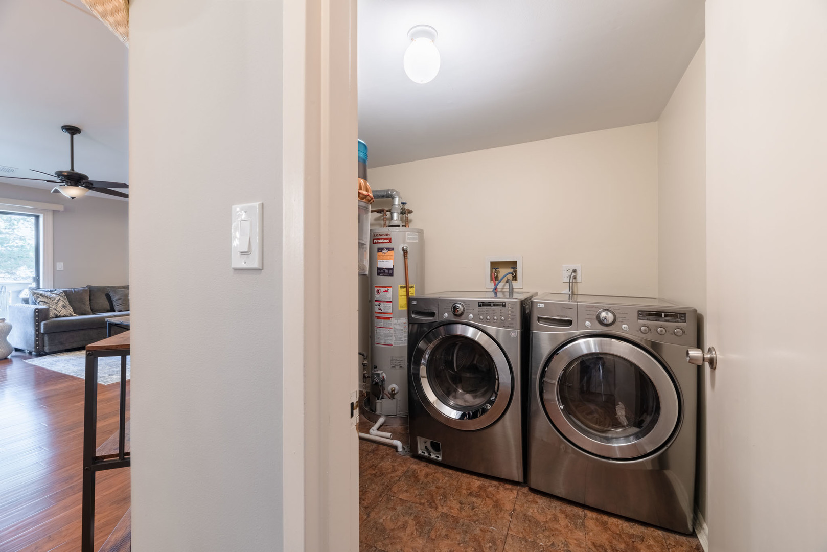 1631 West Partridge Court, Unit 8 Arlington Heights, IL 60004 - Photo 21 of 26 a view of a hallway with washer and dryer