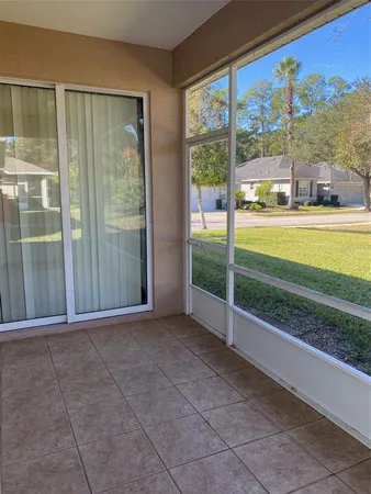 a view of a room with a large window
