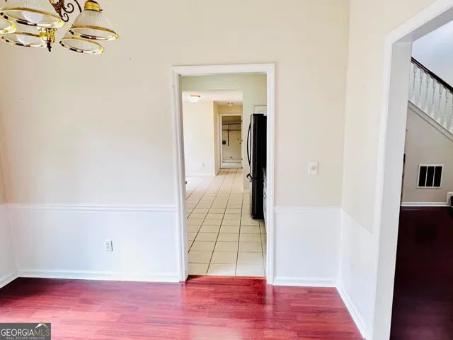 a kitchen with stainless steel appliances granite countertop a sink and cabinets