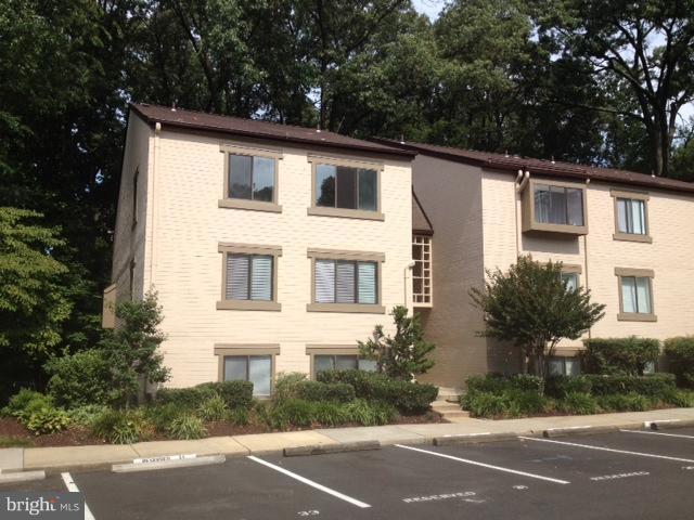 11737 Ledura Court, Unit 201 Reston, VA 20191 - Photo 1 of 5 a view of a house with a street