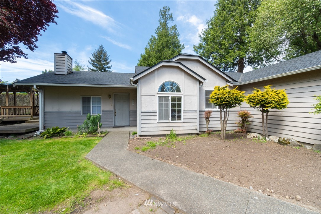 10837 4th Avenue South Seattle, WA 98168 - Photo 3 of 25 a front view of a house with garden