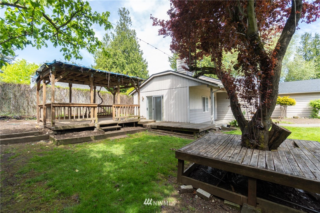 10837 4th Avenue South Seattle, WA 98168 - Photo 6 of 25 a view of a house with backyard and sitting area