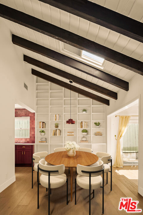 4841 Don Pio Drive Woodland Hills, CA 91364 - Photo 3 of 20 a balcony with table and chairs