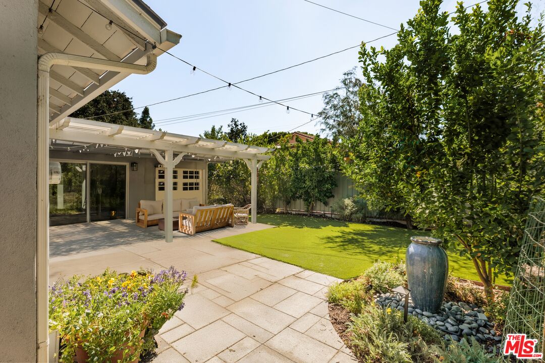 4841 Don Pio Drive Woodland Hills, CA 91364 - Photo 6 of 20 a view of a house with backyard porch and sitting area