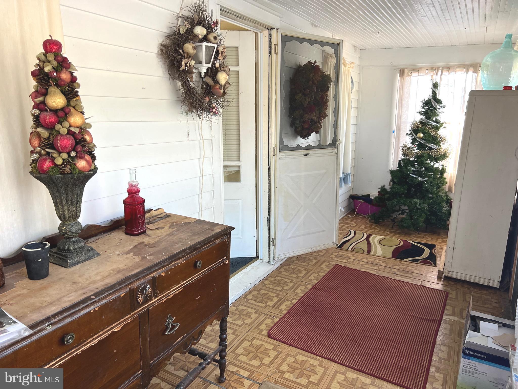 1520 North Little Creek Road Dover, DE 19901 - Photo 18 of 19 Large enclosed front porch