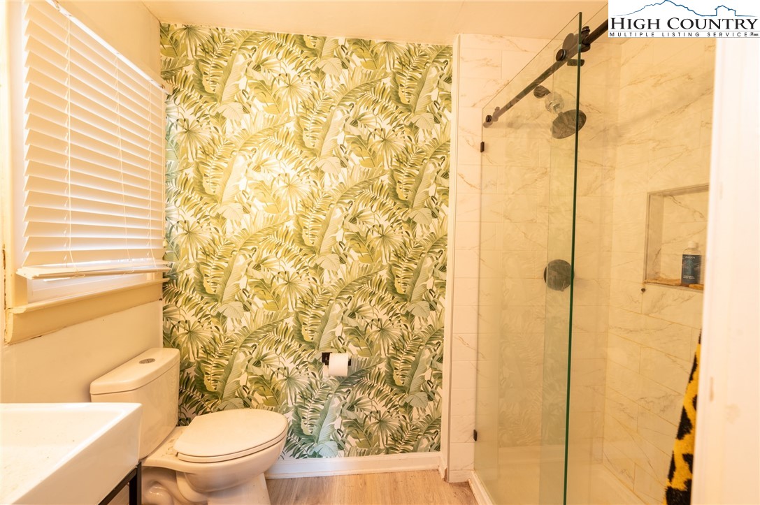 182 Owens Drive Boone, NC 28607 - Photo 13 of 20 a bathroom with a toilet and shower