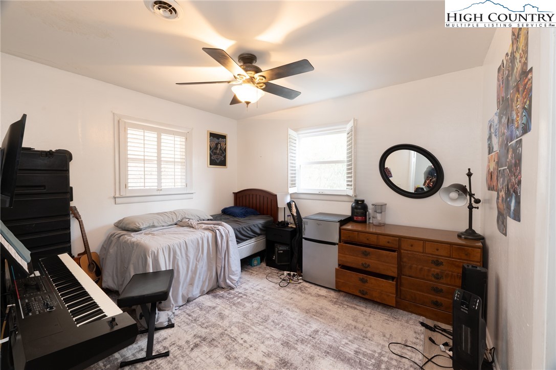 182 Owens Drive Boone, NC 28607 - Photo 14 of 20 a bedroom with bed and a window