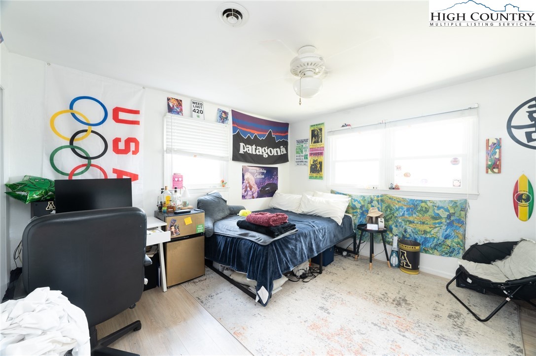 182 Owens Drive Boone, NC 28607 - Photo 15 of 20 a bedroom with furniture and a window