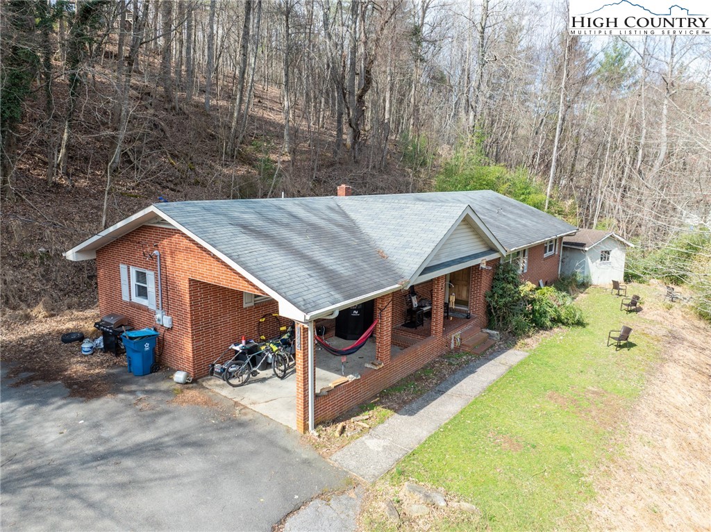182 Owens Drive Boone, NC 28607 - Photo 2 of 20 a view of a house with backyard and sitting area