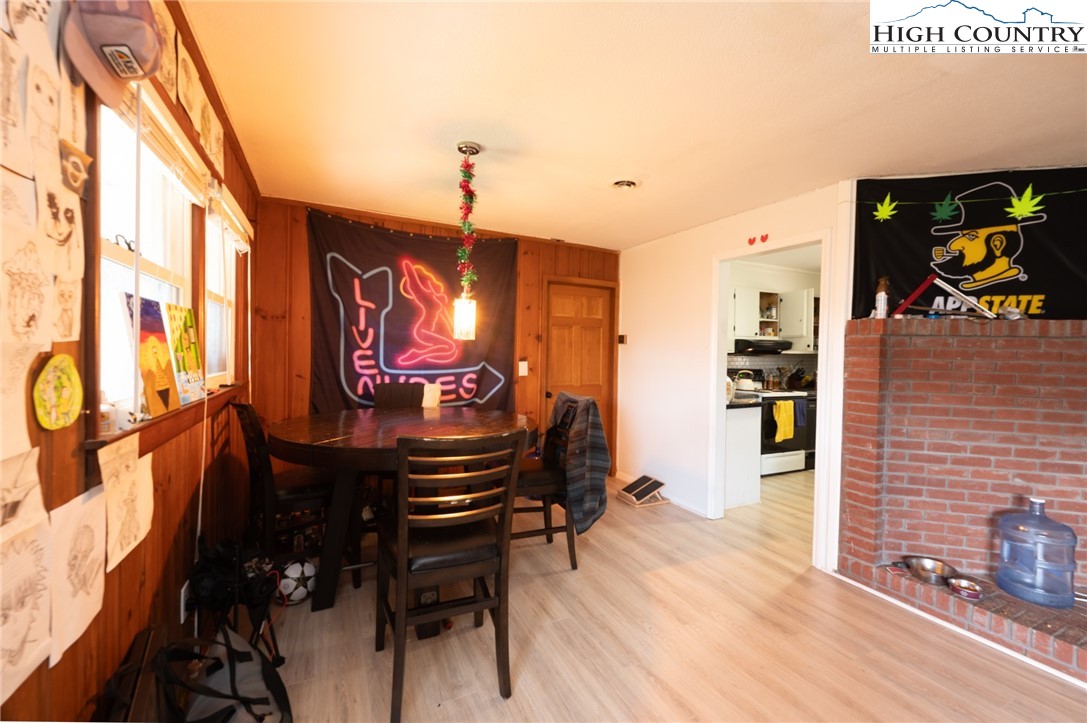 182 Owens Drive Boone, NC 28607 - Photo 9 of 20 a view of a dinning room with furniture and chandelier
