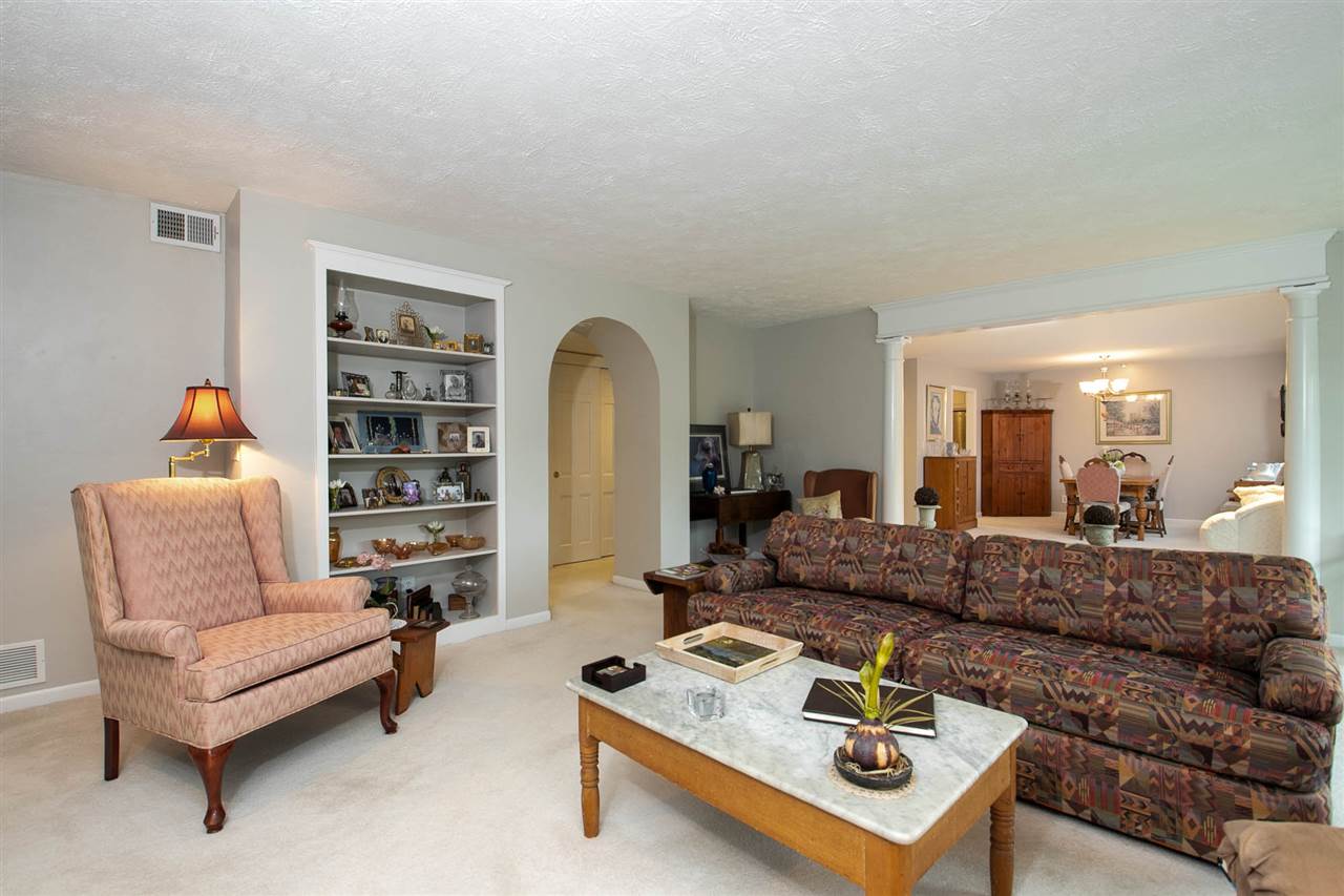 5548 Spring Brook Road, Unit 311 Rockford, IL 61114 - Photo 3 of 20 a living room with furniture and a couch