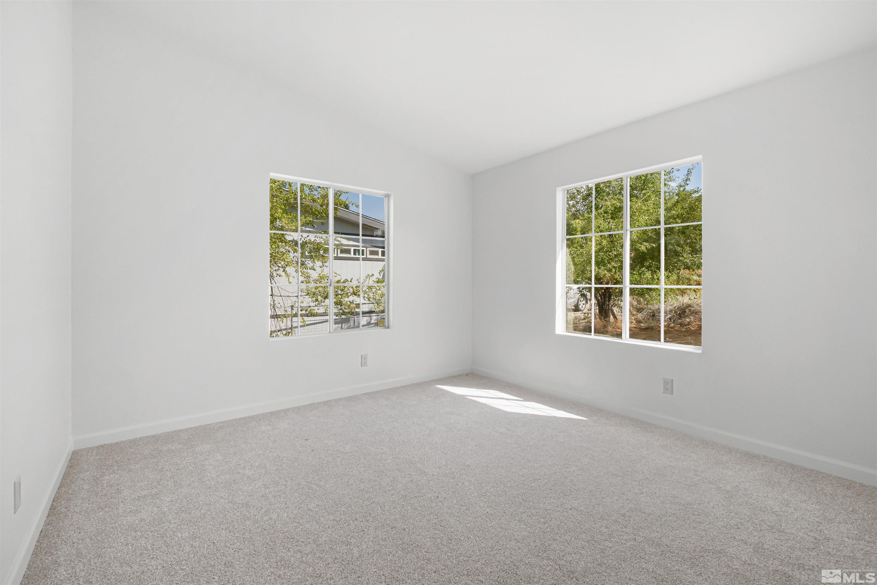 15095 Pinion Drive Reno, NV 89521 - Photo 10 of 18 an empty room with a window