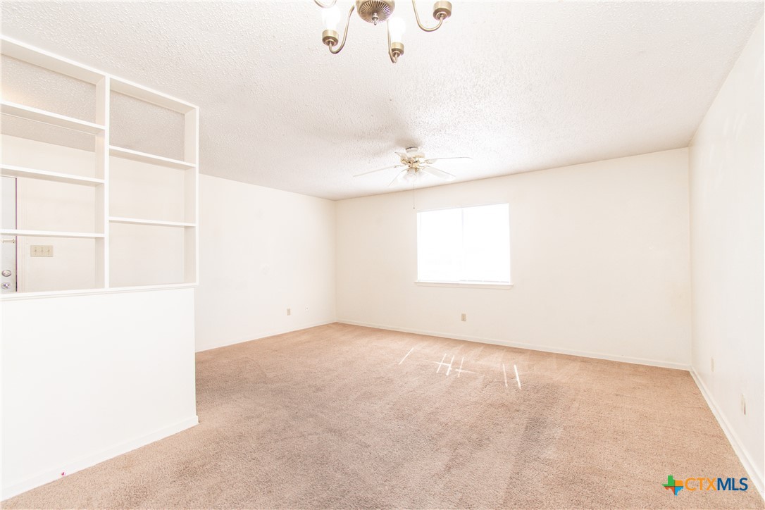507 East Beeline Lane, Unit 3 Harker Heights, TX 76548 - Photo 4 of 13 an empty room with windows