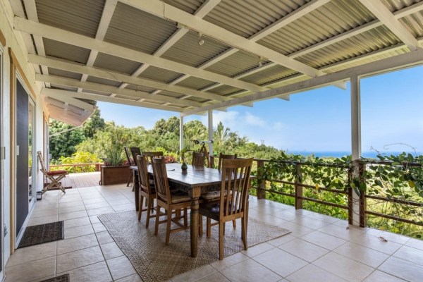 83-5366 Painted Church Road Captain Cook, HI 96704 - Photo 19 of 25 a view of a patio with a table and chairs and potted plants