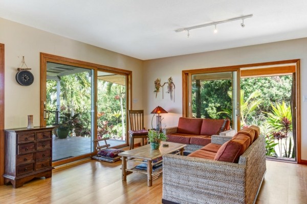 83-5366 Painted Church Road Captain Cook, HI 96704 - Photo 4 of 25 a living room with furniture and large windows
