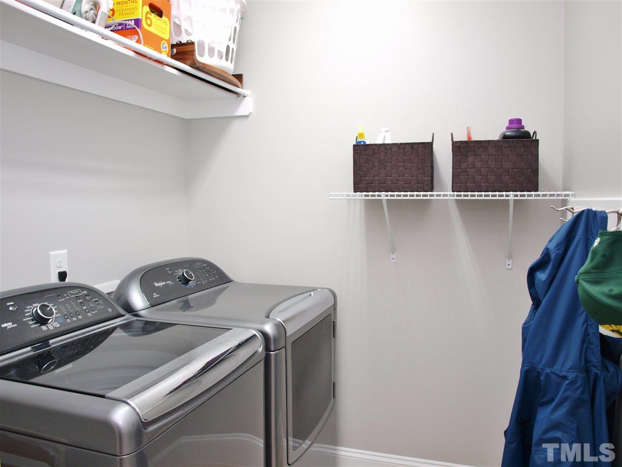 300 Bon Marche Lane Raleigh, NC 27615 - Photo 13 of 25 a utility room with dryer and washer