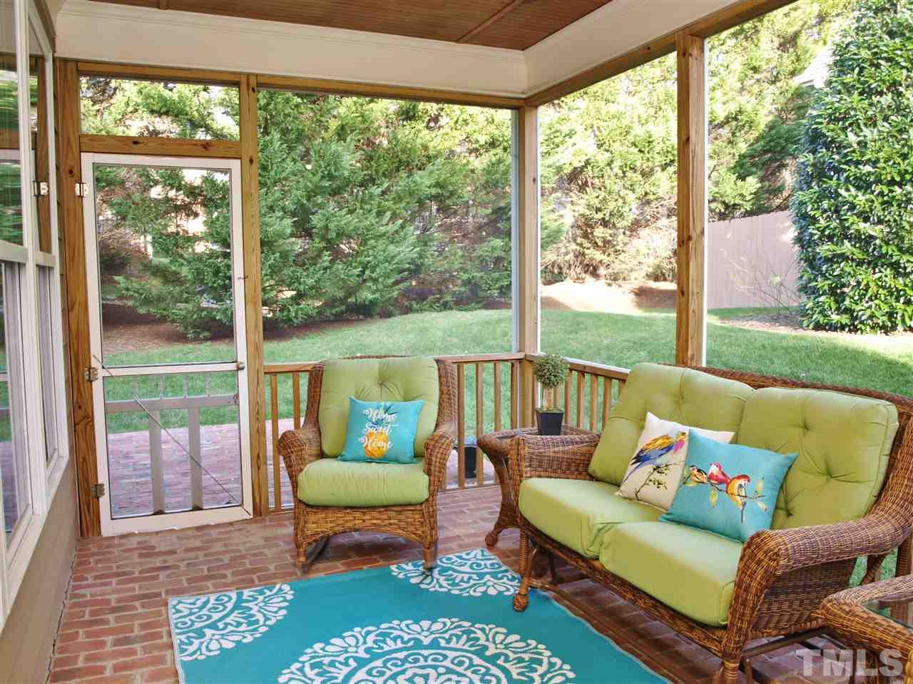 300 Bon Marche Lane Raleigh, NC 27615 - Photo 21 of 25 a balcony with furniture and a garden