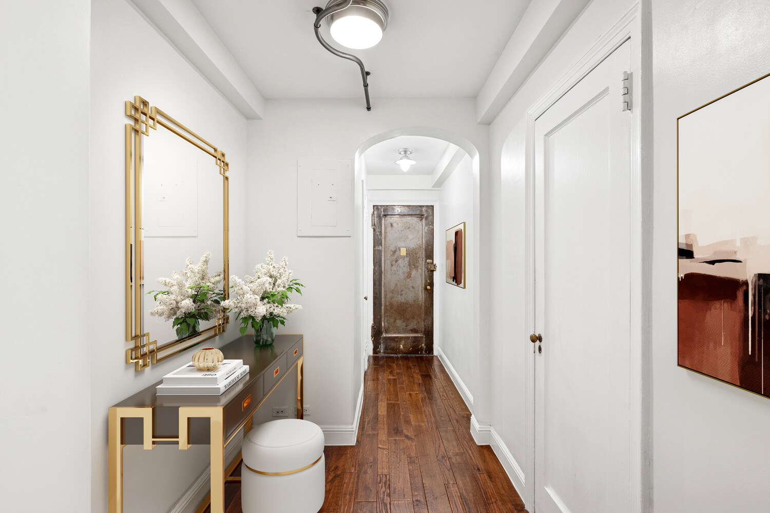 424 East 52nd Street, Unit 2D Manhattan, NY 10022 - Photo 11 of 17 a bathroom with a toilet a sink and a mirror