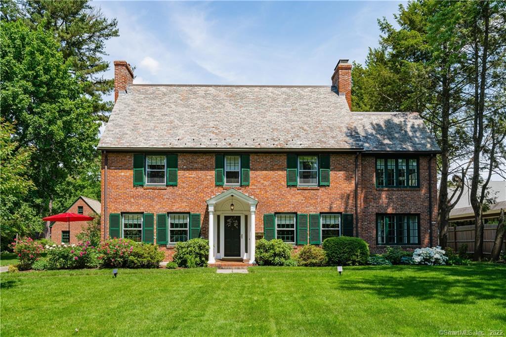 Stately, impeccably maintained move-in ready Brick Colonial.