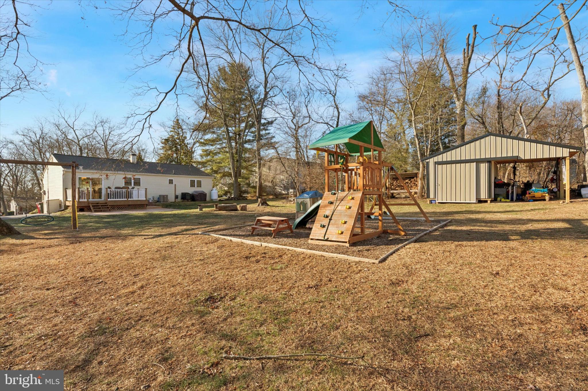 673 Barrington Road Collegeville, PA 19426 - Photo 25 of 28 Swingset & large shed (10'Wx16'Lx7'H)