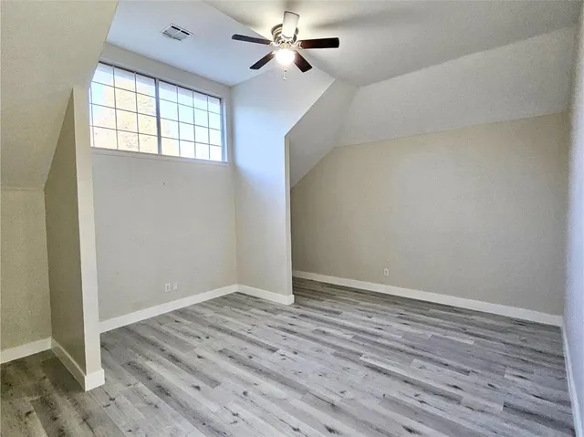 a view of entryway and hall with a dining room