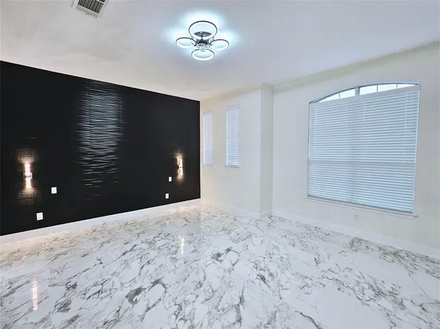 a room with furniture and a window