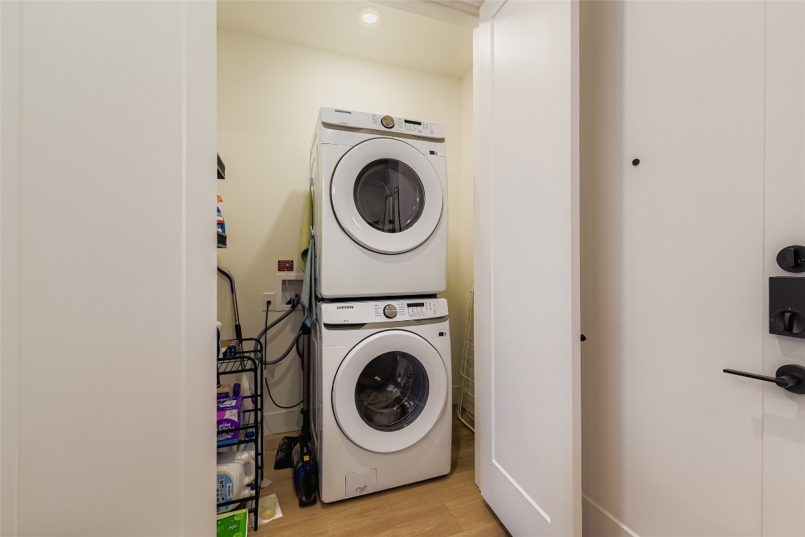 1701 Simond Avenue, Unit 513 Austin, TX 78723 - Photo 11 of 27 a utility room with dryer and washer