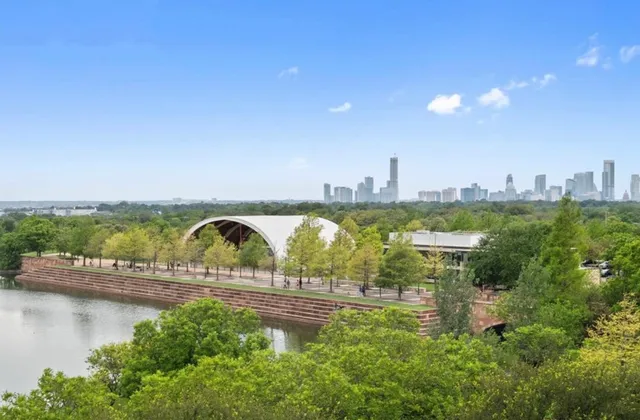 a view of a lake with a city