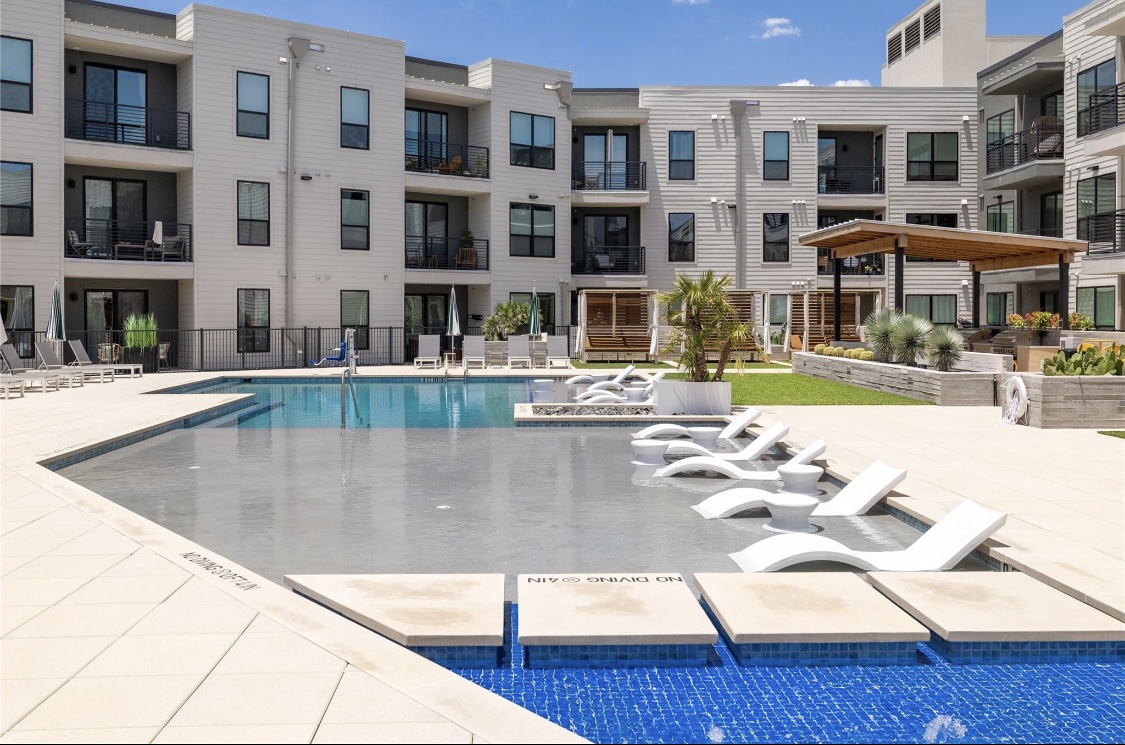 1701 Simond Avenue, Unit 513 Austin, TX 78723 - Photo 15 of 27 a view of pool with outdoor seating