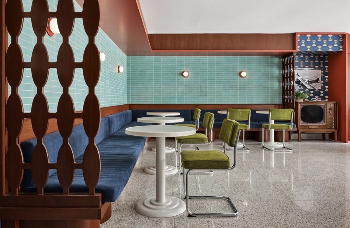1701 Simond Avenue, Unit 513 Austin, TX 78723 - Photo 25 of 27 a dining room with furniture and wooden floor