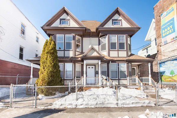 a front view of a house with a porch