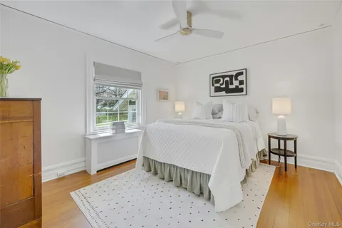 a room with a bed and a table in it
