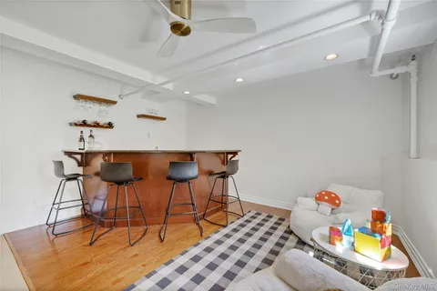 a room with furniture and a chandelier