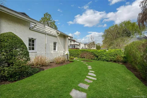 a backyard of a house with lots of green space