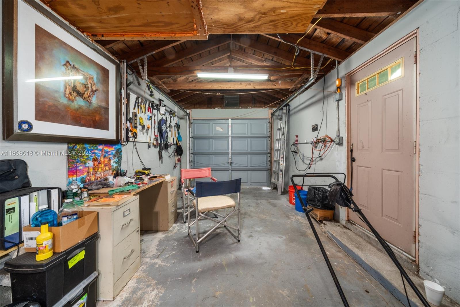 1612 Hitakee Avenue Sebring, FL 33870 - Photo 27 of 34 a storage room with washer and dryer