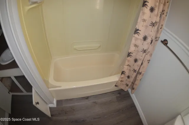 a view of hallway with a front door