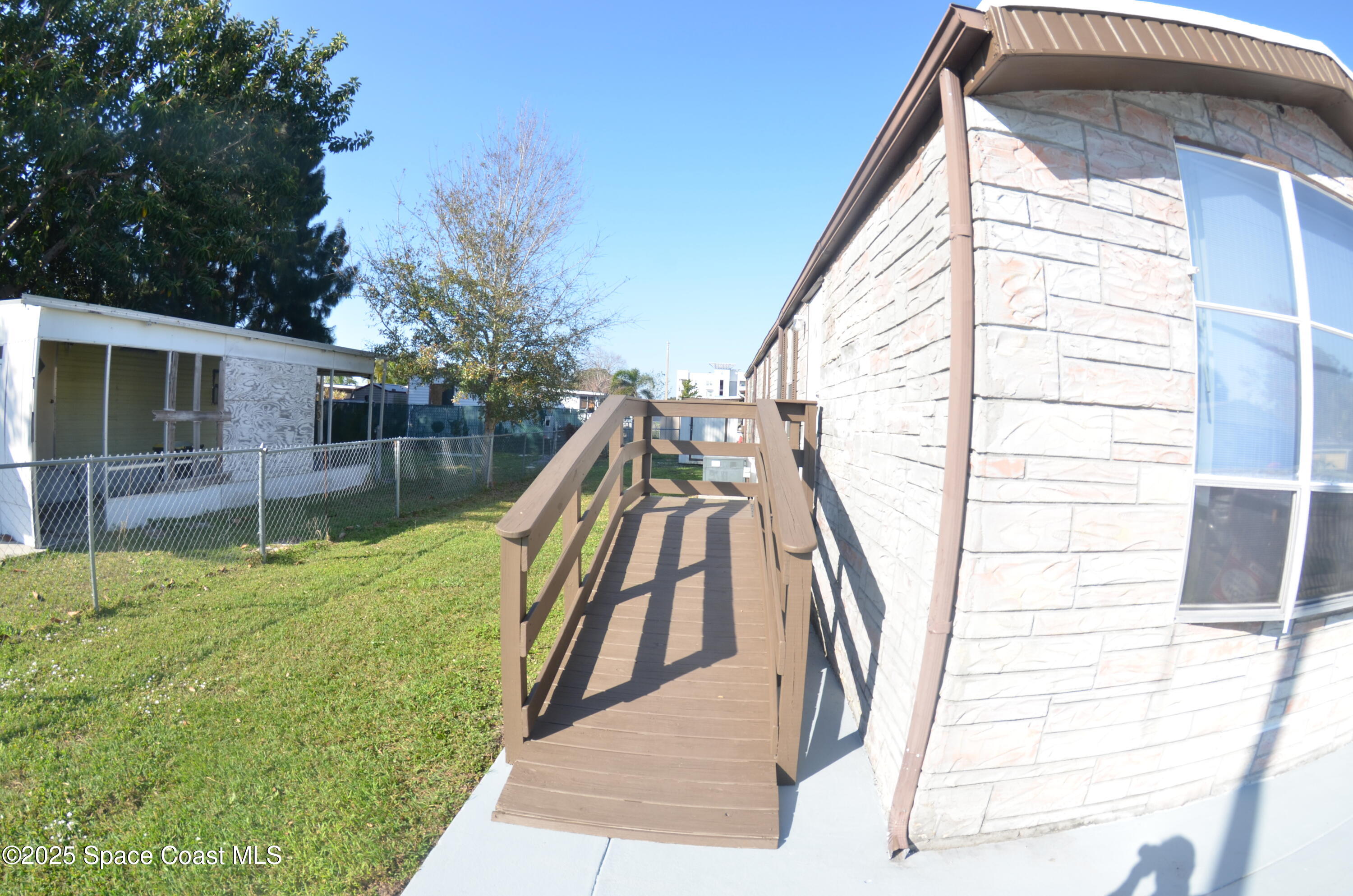 2535 Haverhill Road Northeast Palm Bay, FL 32905 - Photo 3 of 18 a view of outdoor space deck and entertaining space